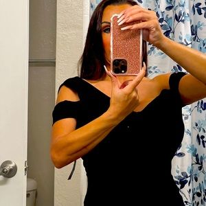 Black dress new off the shoulder. Slit in front. Beautiful off the shoulder